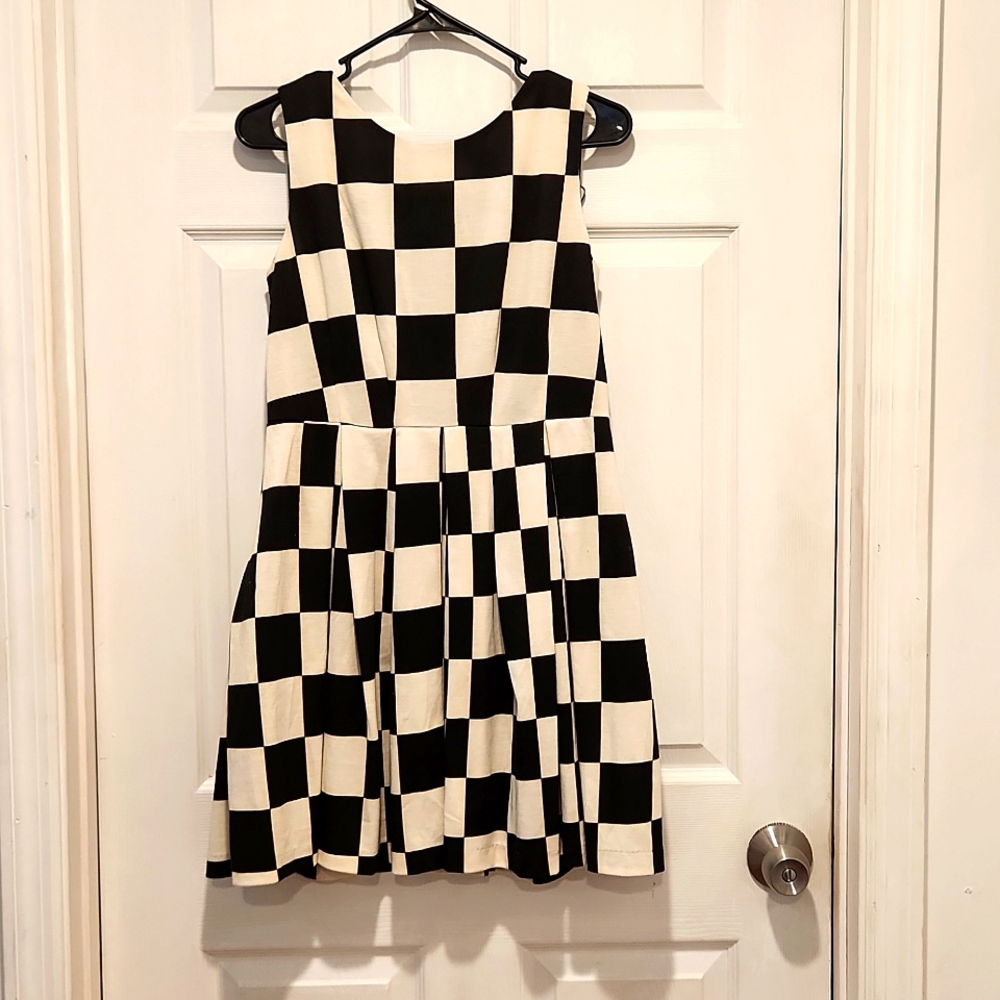 Pleated black and creme checkered dress